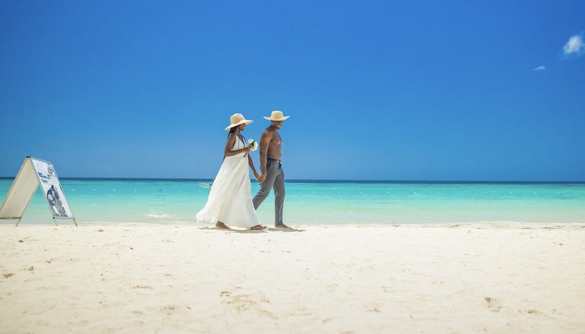 Couple walking on the beach